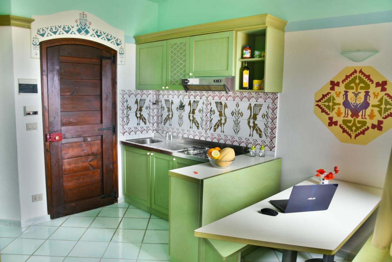Casa Mare Cala Rossa Appartement Trinità dʼAgultu Buitenkant foto